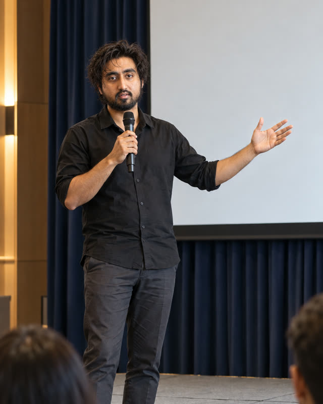 Sam Sakib speaking on stage